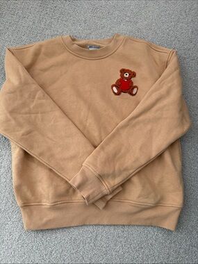 Amazon Essentials Sofia grange Women's Tan Crewneck Sweater with Teddy Patch